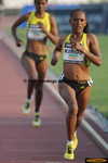 Aheza Kiros, 2009 Carlsbad 5,000 champion, surges into the lead