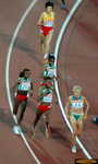 Tirunesh Dibaba and Berhane Adere lead the Ethiopian juggernaut on the bell lap of the 10,000 meters